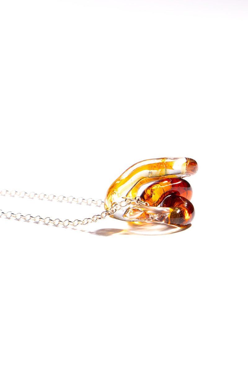 INTERCONEXION PENDANT IN AMBER