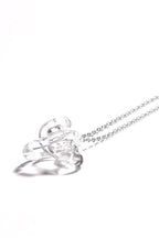 INTERCONEXION PENDANT IN TRANSPARENT