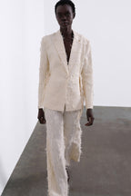 JORA FRINGE TROUSERS IN CREAM